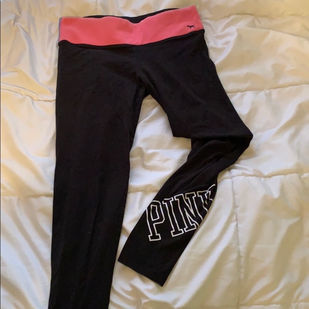 three pairs of PINK leggings